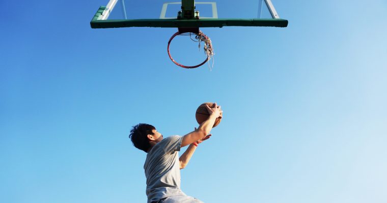 Dunking a basketball